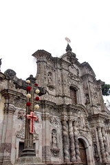 Cross decorated with flowers for Easter in The Church of la Compania de Jesus in the Old Town, Quito, Ecuador