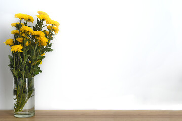 Bouquet of chrysanthemums in a vase on a white background