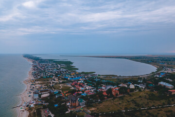 Top view of hotel-type houses on the coast of the Sea of ​​Azov. Rest on the seashore. Resort place. "Fedotov braid". located in Kyrylivka in southern Ukraine