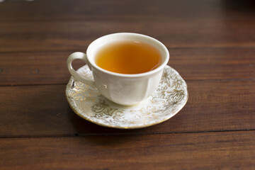 Herbal teaCup of  served in a vintage tea cup and saucer.Include Clipping Path.