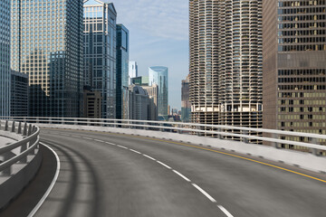Obraz premium Empty urban asphalt road exterior with city buildings background. New modern highway concrete construction. Concept of way to success. Transportation logistic industry fast delivery. Chicago. USA.