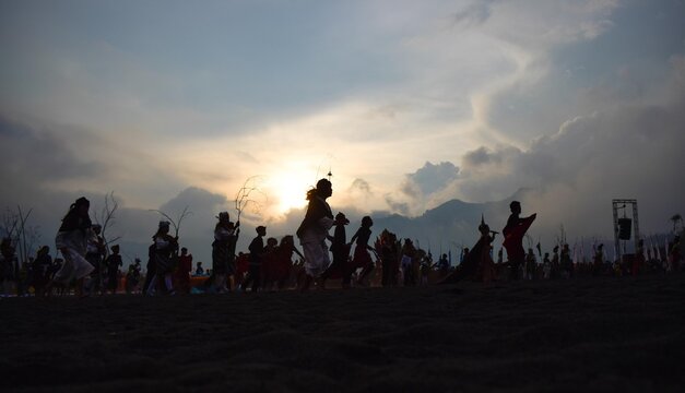 Silhouette photo of a local cultural performance, traditional dance, java people.