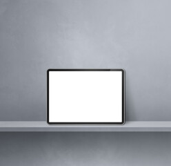 Digital tablet pc on grey wall shelf. Square background banner