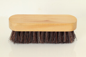 Clothes brush. Brush for cleaning clothes from dirt and dust.