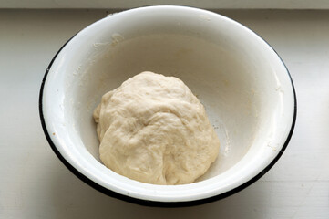 a piece of dough in a bowl