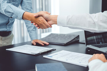 Shaking hands Business people greeting new colleagues while job interviewing shaking hands meeting Planning after during job interview Concept