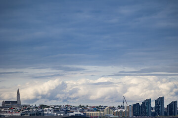 Fototapeta na wymiar City of Reykjavik skyline with new construction crane on the horizon 