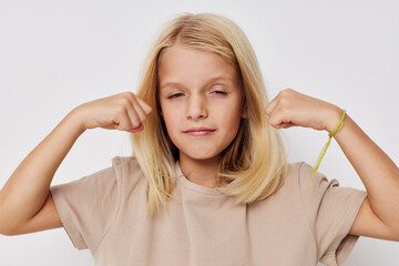 Fototapeta premium Positive little girl fashionable baby clothes kids lifestyle concept