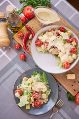 Healthy Grilled Chicken Caesar Salad with Cheese, tomatoes and Croutons