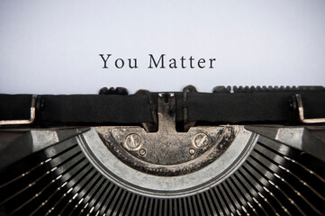 You matter text typed on an old vintage typewriter. Motivational concept