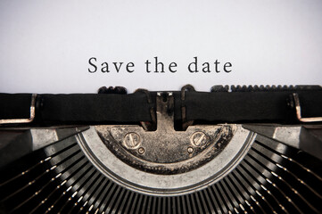 Save the date text typed on an old vintage typewriter.