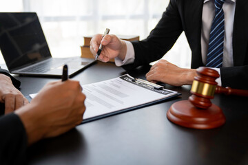 Lawyer or judge advising client's trial at attorney's office, litigation counseling ideas with...