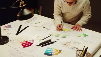 Architect designer workplace top view. Professional engineer drawing, interior creator working with house project at night, blueprint plan, drafting building.