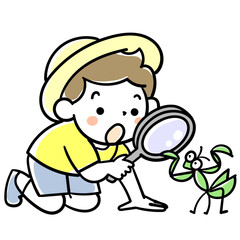 虫眼鏡でカマキリを観察する男の子