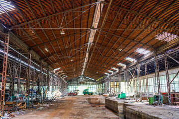 An abandoned steel frame structure automobile production workshop