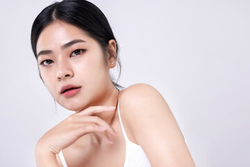 Studio shot of Beautiful young Asian woman with clean fresh skin on white background, Face care,...