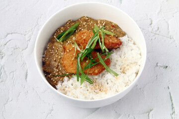 Freshly cooked Japanese food called Menchi Katsu Curry
