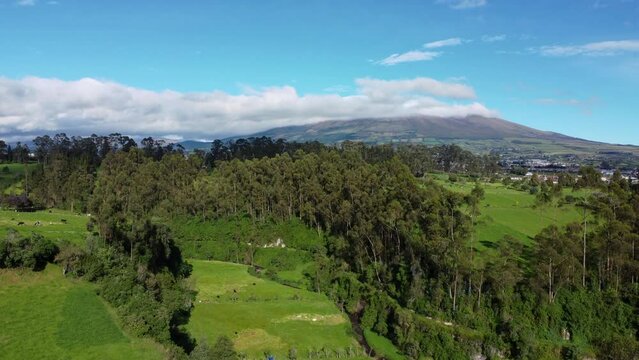 aerial drone view showing Volcano Corazon from a field in machachi, Ecuador. 4K videos