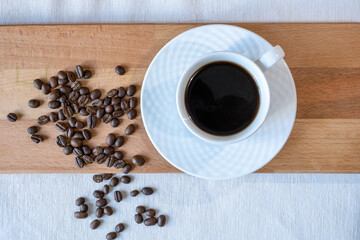 cup of coffee with beans