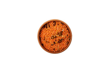 Indian soup with lentils. Masurdal or Dal. Mix of Uncooked ingredients for soup-mashed with curry. Dry legumes in a ceramic bowl, top view. Dried vegetables. Long-term storage Healthy Food
