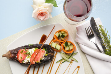 Greek dishes served with drinks on the restaurant table