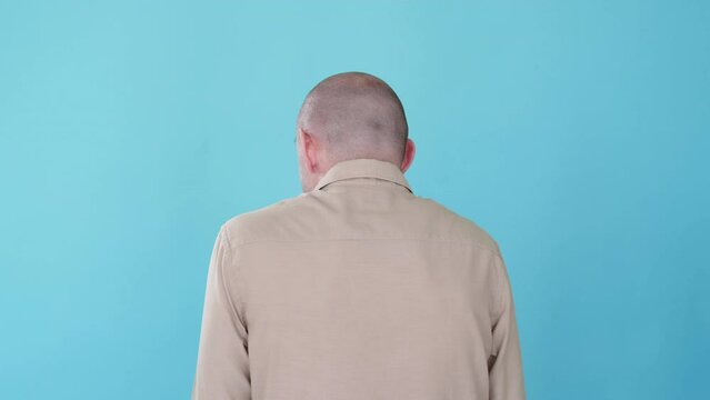 Shy man. Curious reaction. Boomerang animation. Awkward flirt. Embarrassed sneaky funny guy turning head oops gif loop isolated on white copy space background.