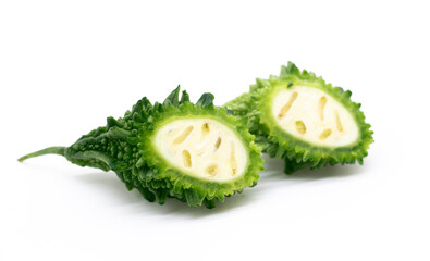 green Bitter melon or Bitter gourd slices isolated on white background, food concept