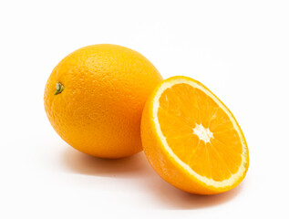 whole and slices orange fruit isolated on white background.