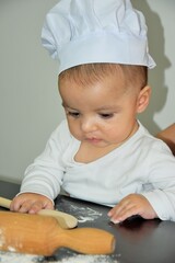 baby chef in kitchen 