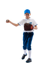 Little boy, baseball player, pitcher in blue-white uniform training isolated on white studio background. Concept of sport, achievements, studying, competition.