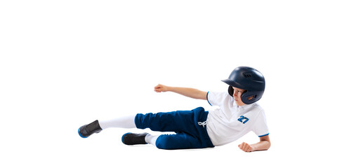 Little beginner baseball player in sports uniform playing baseball isolated on white background. Concept of sport, achievements, competition