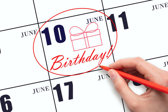 The hand circles the date on the calendar 10 June, draws a gift box and writes the text Birthday. Holiday.