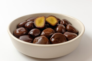 smoked quail eggs on a white background