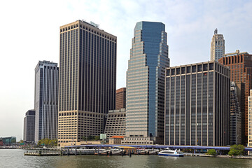 Naklejka premium Financial District of Lower Manhattan, neighborhood on southern tip of Manhattan island in New York City. View from water