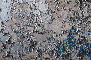 Closeup shot of dirty shabby wall in abandoned building.