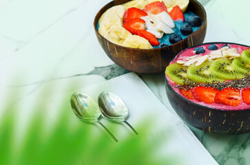 Smoothie bowls. It is a kind of Balinese breakfast reach of superfoods. Made with fruits, berries, chia seeds, spirulina and coconuts. Great healthy vegan detox food.