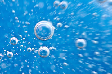 Water. Movement of air bubbles blue beautiful abstract underwater background