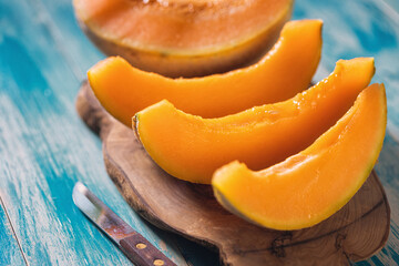 Sliced ripe melon on a cutting board 