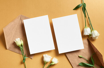 Wedding invitation card mockup with envelope and white eustoma flowers, front and back sides