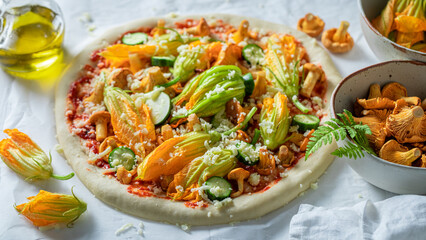 Ingredients for healthy pizza made of mushrooms and zucchini flower.