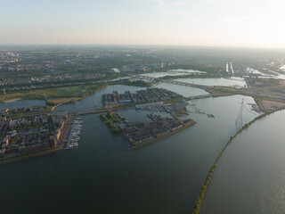 Amsterdam Steigereiland overhead on Ijburg artificial island modern residential area smart city cityscape at water Ijmeer. Urban houses buildings city environment area.