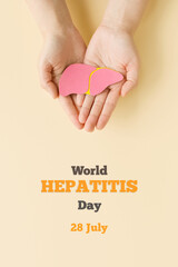 World hepatitis day. Adult hands holding liver on beige background. Awareness of prevention and...
