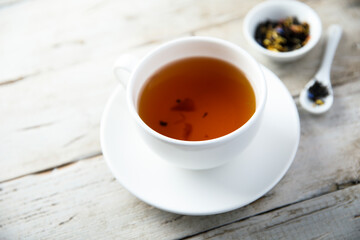 Healthy black tea with flowers