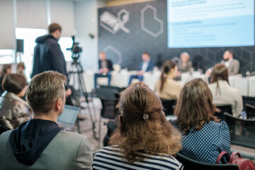 Fototapeta premium Businesspeople listening to speaker during conference