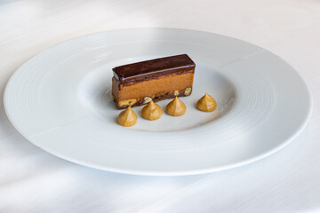 piece of chocolate cake with nuts dessert