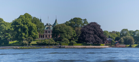 The point T&auml;cka Udden on the island Djurg&aring;rden a sunny summer day in Stockholm  