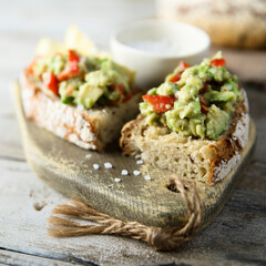 Homemade avocado toast with tomatoes