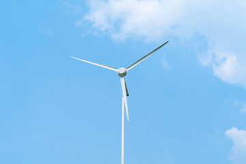 Wind turbines or windmills farm field in industry factory. Power, sustainable green clean energy, and environment concept. Nature innovation.