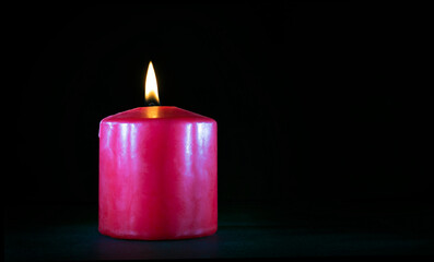 Copy space around a burning candle