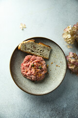 Traditional homemade steak tartare with capers